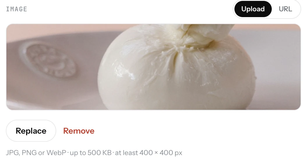 The image field in the item editor with a photo of burrata already set, and the Replace and Remove buttons