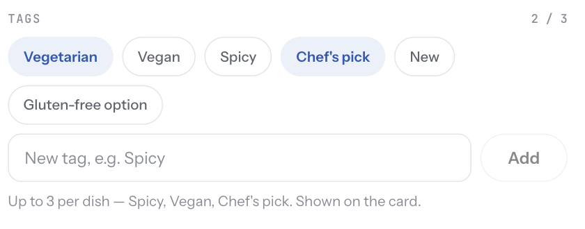 The Tags field in the item editor with Spicy and Vegan selected and the counter at 2 of 3